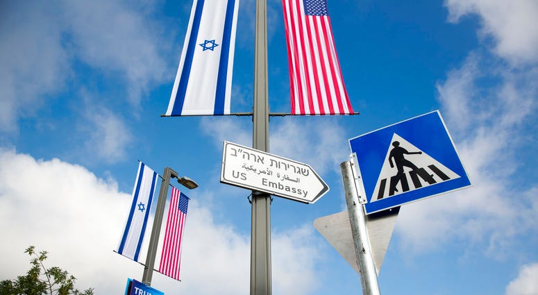 A road sign leading to the U.S. Embassy is seen ahead the official opening in Jerusalem. A road sign leading to the U.S. Embassy is seen ahead the official opening in Jerusalem.