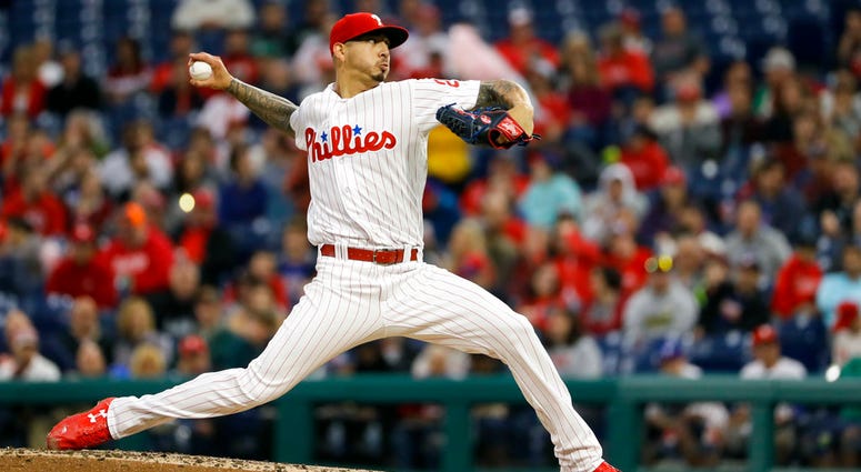 Philadelphia Phillies' Vince Velasquez pitches during the third inning of a baseball game against the Atlanta Braves. Philadelphia Phillies' Vince Velasquez pitches during the third inning of a baseball game against the Atlanta Braves.