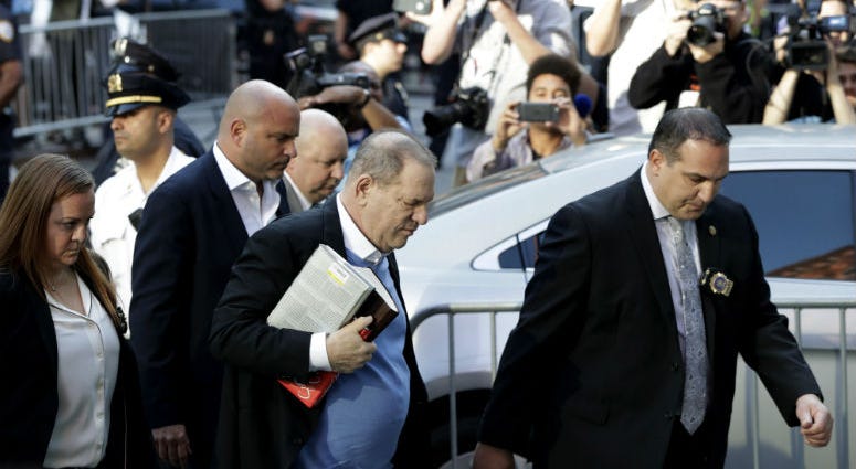 Harvey Weinstein arrives at the first precinct while turning himself to authorities following allegations of sexual misconduct, Friday, May 25, 2018, in New York. Harvey Weinstein arrives at the first precinct while turning himself to authorities following allegations of sexual misconduct, Friday, May 25, 2018, in New York.