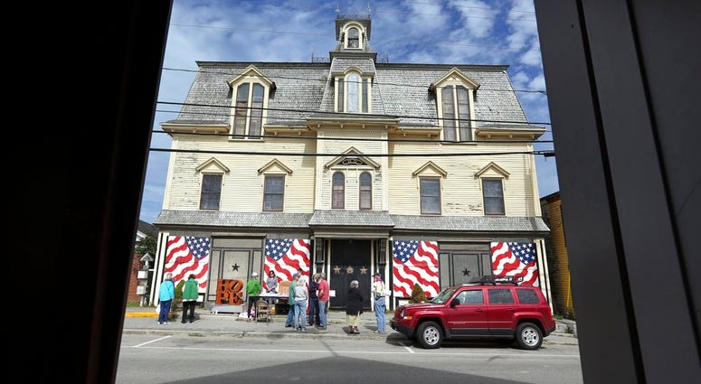 In this Sept. 13, 2014, file photo, fans gather outside "Star of Hope" the residence of artist Robert Indiana on Vinalhaven Island, Maine. Indiana died on May 19, 2018. Robert Indiana's Home