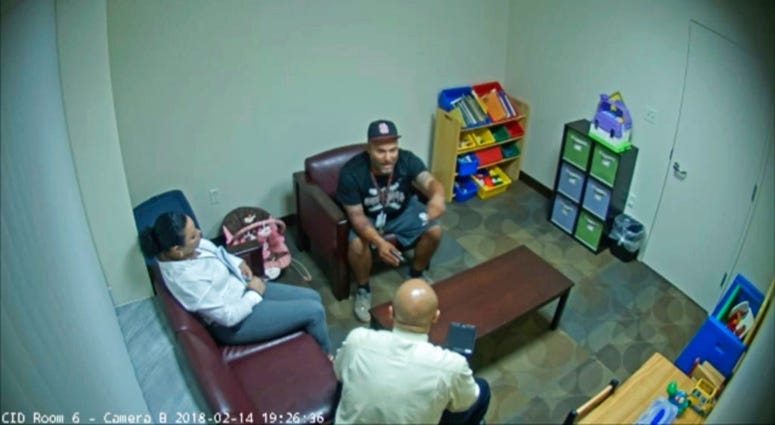 In this Feb. 14, 2018 frame from surveillance video provided by the Broward Sheriff's Office, Andrew Medina, center, is interviewed by detectives following the shooting at Marjory Stoneman Douglas High School in Florida. In this Feb. 14, 2018 frame from surveillance video provided by the Broward Sheriff's Office, Andrew Medina, center, is interviewed by detectives following the shooting at Marjory Stoneman Douglas High School in Florida.