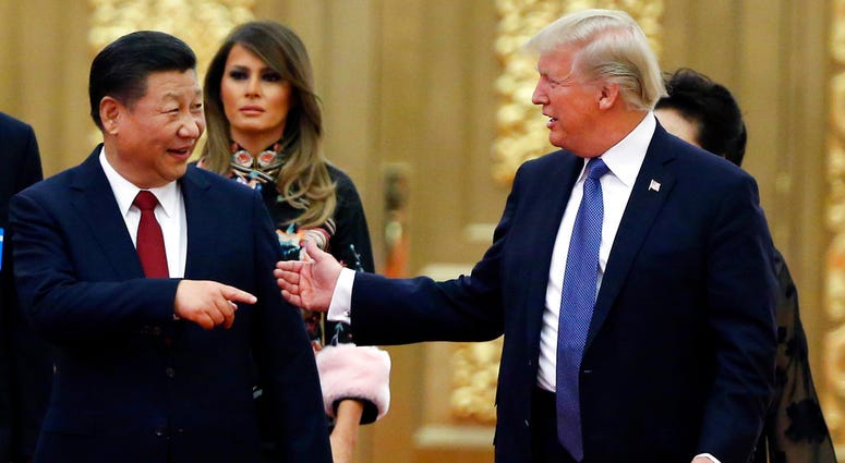 U.S. President Donald Trump China's President Xi Jinping arrive for the state dinner with the first ladies at the Great Hall of the People in Beijing, China. U.S. President Donald Trump China's President Xi Jinping arrive for the state dinner with the first ladies at the Great Hall of the People in Beijing, China.