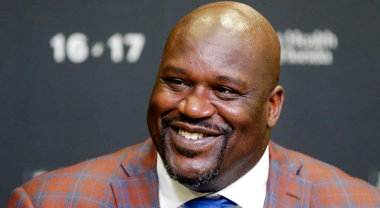 In this Dec. 22, 2016, file photo, retired Hall of Fame basketball player Shaquille O'Neal smiles as he talks to reporters during an NBA basketball news conference in Miami. Shaquille O'Neal