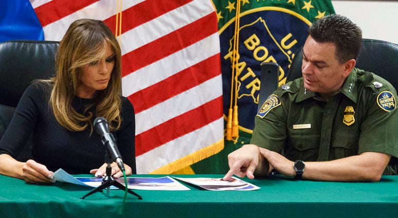 Rodolfo Karisch, Chief Patrol Agent TCA Border Patrol, right, talks with first lady Melania Trump during a roundtable discussion as she visits a U.S. Customs and border and protection facility in Tucson, Ariz. Rodolfo Karisch, Chief Patrol Agent TCA Border Patrol, right, talks with first lady Melania Trump during a roundtable discussion as she visits a U.S. Customs and border and protection facility in Tucson, Ariz.