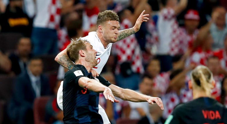 England's Kieran Trippier, right, challenges for the ball with Croatia's Ivan Strinic during the semifinal match between Croatia and England at the 2018 soccer World Cup in the Luzhniki Stadium. England's Kieran Trippier, right, challenges for the ball with Croatia's Ivan Strinic during the semifinal match between Croatia and England at the 2018 soccer World Cup in the Luzhniki Stadium.