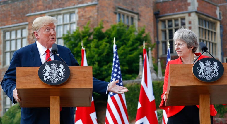 President Donald Trump with British Prime Minister Theresa May during their joint news conference at Chequers, in Buckinghamshire, England. President Donald Trump with British Prime Minister Theresa May