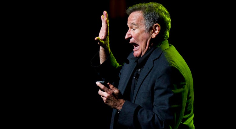 In this Nov. 8, 2012 file photo, Robin Williams performs at the 6th Annual Stand Up For Heroes benefit concert for injured service members and veterans in New York. Robin Williams