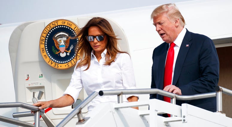 President Donald Trump and first lady Melania Trump arrive on Air Force One at Morristown Municipal Airport, in Morristown, N.J., Friday, July 27, 2018, en route to Trump National Golf Club in Bedminster, N.J. President Donald Trump and first lady Melania Trump arrive on Air Force One at Morristown Municipal Airport, in Morristown, N.J., Friday, July 27, 2018, en route to Trump National Golf Club in Bedminster, N.J.