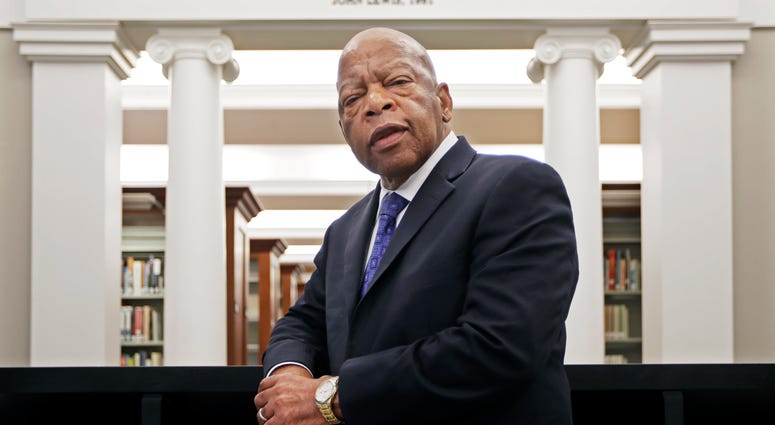 U.S. Rep. John Lewis, D-Ga., poses for a photograph under a quote of his that is displayed in the Civil Rights Room in the Nashville Public Library in Nashville, Tenn. U.S. Rep. John Lewis, D-Ga., poses for a photograph under a quote of his that is displayed in the Civil Rights Room in the Nashville Public Library in Nashville, Tenn.