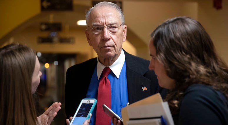 In this May 24, 2018, file photo, Senate Judiciary Committee Chairman Chuck Grassley, R-Iowa, speaks to reporters on Capitol Hill in Washington. In this May 24, 2018, file photo, Senate Judiciary Committee Chairman Chuck Grassley, R-Iowa, speaks to reporters on Capitol Hill in Washington.