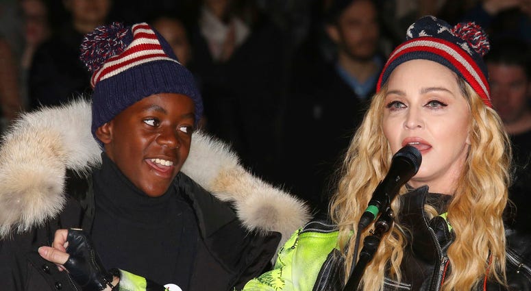 In this Nov 7, 2016 file photo, U.S. Singer Madonna, right, and her son David Banda perform in support of Democratic presidential candidate Hillary Clinton at Washington Square Park. In this Nov 7, 2016 file photo, U.S. Singer Madonna, right, and her son David Banda perform in support of Democratic presidential candidate Hillary Clinton at Washington Square Park.