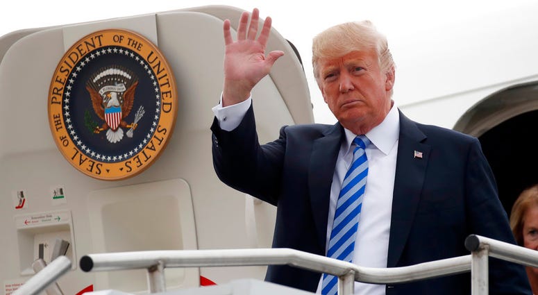President Donald Trump waves as he steps off Air Force One, Tuesday, Aug. 21, 2018, in Charleston, W.Va. President Donald Trump waves as he steps off Air Force One, Tuesday, Aug. 21, 2018, in Charleston, W.Va.