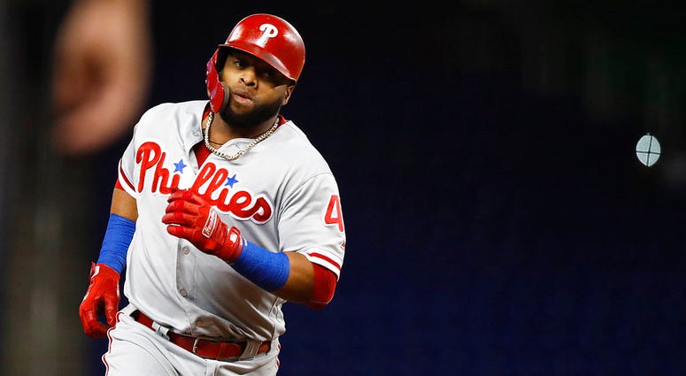 Philadelphia Phillies' Carlos Santana rounds third after hitting a solo home run during the first inning of a baseball game against the Miami Marlins, Tuesday, Sept. 4, 2018, in Miami. Philadelphia Phillies' Carlos Santana rounds third after hitting a solo home run during the first inning of a baseball game against the Miami Marlins, Tuesday, Sept. 4, 2018, in Miami.