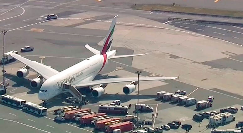 In this frame from video emergency response crews gather outside a plane at JFK Airport amid reports of ill passengers aboard a flight from Dubai on Wednesday, Sept. 5, 2018, in New York. In this frame from video emergency response crews gather outside a plane at JFK Airport amid reports of ill passengers aboard a flight from Dubai on Wednesday, Sept. 5, 2018, in New York.