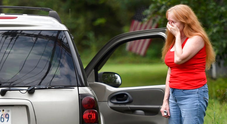Shirley Pollack, of Perryville, Md. reacts to what authorities have called a shooting with multiple victims in Perryman, Md. on Thursday, Sept. 20, 2018.