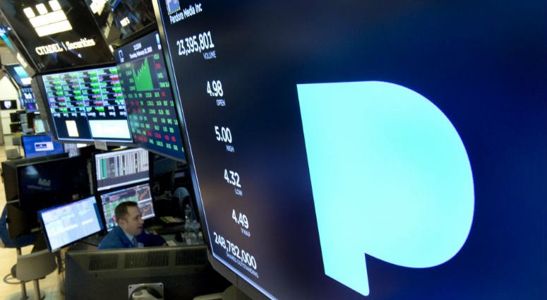 In this Feb. 22, 2018, file photo, the Pandora logo appears above a trading post on the floor of the New York Stock Exchange. In this Feb. 22, 2018, file photo, the Pandora logo appears above a trading post on the floor of the New York Stock Exchange.