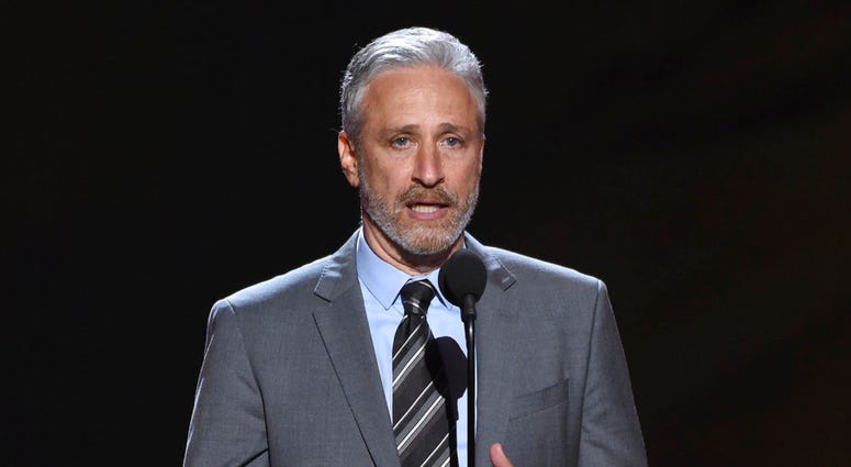 In this July 18, 2018, file photo on Stewart presents the Pat Tillman award for service at the ESPY Awards at Microsoft Theater in Los Angeles. Jon Stewart