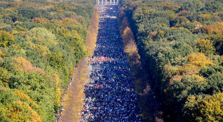 Thousands of people attend a demonstration with the slogan 'indivisible' against hate and four solidarity instead of exclusion in Berlin, Germany, Saturday, Oct. 13, 2018. Thousands of people attend a demonstration with the slogan 'indivisible' against hate and four solidarity instead of exclusion in Berlin, Germany, Saturday, Oct. 13, 2018.