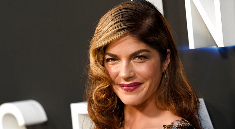 In this April 9, 2018 file photo, Selma Blair arrives at the Los Angeles premiere of "Lost in Space" at the ArcLight Cinerama Dome.