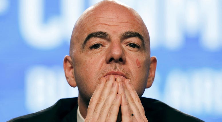 In this April 12, 2018 file photo, FIFA President Gianni Infantino participates in the annual conference of the South American Football Confederation, CONMEBOL, in Buenos Aires, Argentina. FIFA President Gianni Infantino