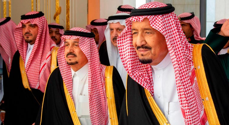 In this photo provided by the Saudi Press Agency, SPA, Saudi King Salman, right, with dignitaries before he gives his annual policy speech at the consultative Shura Council, Monday, Nov. 19, 2018, Riyadh, Saudi Arabia. In this photo provided by the Saudi Press Agency, SPA, Saudi King Salman, right, with dignitaries before he gives his annual policy speech at the consultative Shura Council, Monday, Nov. 19, 2018, Riyadh, Saudi Arabia.