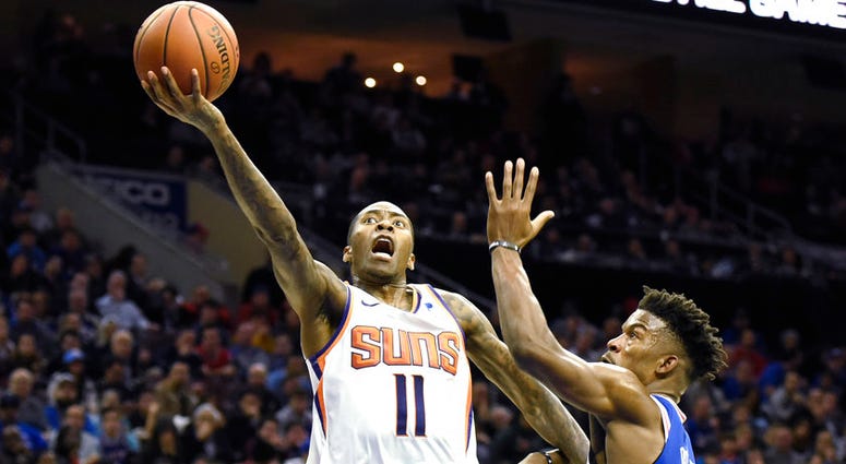 Phoenix Suns' Jamal Crawford (11) drives to the basket past Philadelphia 76ers' Jimmy Butler (23) in the first half of an NBA basketball game, Monday, Nov. 19, 2018, in Philadelphia. Phoenix Suns' Jamal Crawford (11) drives to the basket past Philadelphia 76ers' Jimmy Butler (23) in the first half of an NBA basketball game, Monday, Nov. 19, 2018, in Philadelphia.