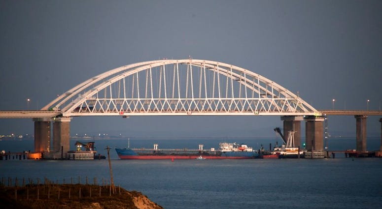 The Kerch bridge is seen blocked for ships entrance, near Kerch, Crimea, Sunday, Nov. 25, 2018. The Kerch bridge is seen blocked for ships entrance, near Kerch, Crimea, Sunday, Nov. 25, 2018.