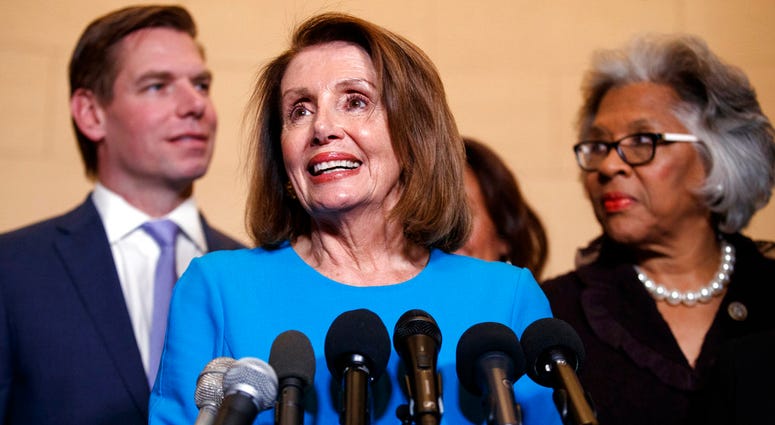 House Minority Leader Nancy Pelosi, joined by Rep. Eric Swalwell (left), and Rep. Joyce Beatty, speaks to media at Longworth House Office Building on Capitol Hill, Nov. 28, 2018, to announce her nomination by House Dems to lead them in the new Congress. House Minority Leader Nancy Pelosi, joined by Rep. Eric Swalwell (left), and Rep. Joyce Beatty, speaks to media at Longworth House Office Building on Capitol Hill, Nov. 28, 2018, to announce her nomination by House Dems to lead them in the new Congress.