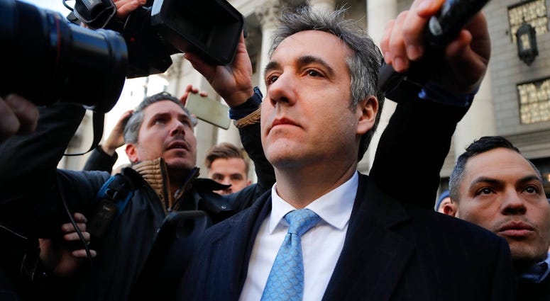 Michael Cohen walks out of federal court, Thursday, Nov. 29, 2018, in New York. Michael Cohen walks out of federal court, Thursday, Nov. 29, 2018, in New York.
