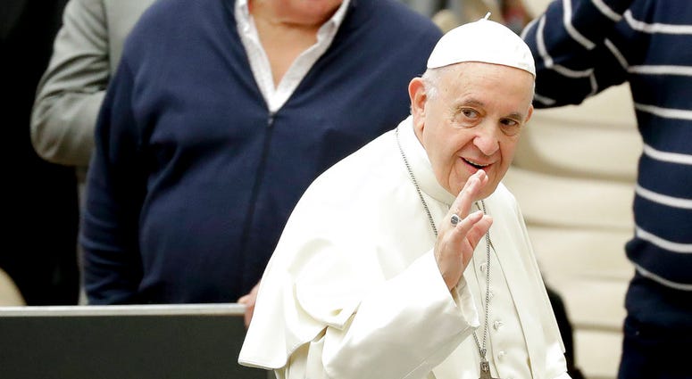 Pope Francis arrives for his weekly general audience, in the Pope Paul VI hall, at the Vatican, Wednesday, Dec. 5, 2018. Pope Francis
