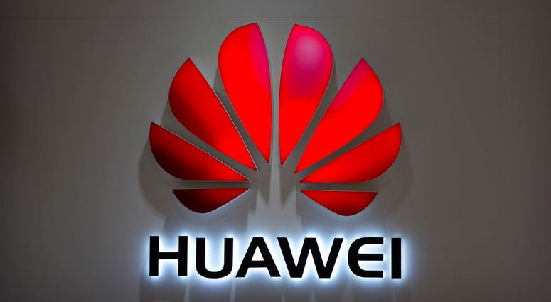 FILE - In this July 4, 2018, file photo, the Huawei logo is seen at a Huawei store at a shopping mall in Beijing. Canadian authorities said Wednesday, Dec. 5, 2018, that they have arrested the chief financial officer of China's Huawei Technologies for pos FILE - In this July 4, 2018, file photo, the Huawei logo is seen at a Huawei store at a shopping mall in Beijing. Canadian authorities said Wednesday, Dec. 5, 2018, that they have arrested the chief financial officer of China's Huawei Technologies for pos