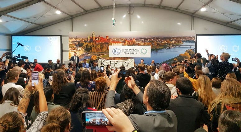 Youth and indigenous groups protest against fossil fuels during US-hosted event at the UN climate talks in Katowice, Poland, Monday, Dec. 10, 2018, as the COP24 UN Climate Change Conference takes place in the city. Youth and indigenous groups protest against fossil fuels during US-hosted event at the UN climate talks in Katowice, Poland, Monday, Dec. 10, 2018, as the COP24 UN Climate Change Conference takes place in the city.
