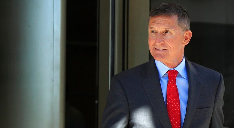 In this Tuesday, July 10, 2018 file photo, former Trump national security adviser Michael Flynn leaves federal courthouse in Washington, following a status hearing. Michael Flynn