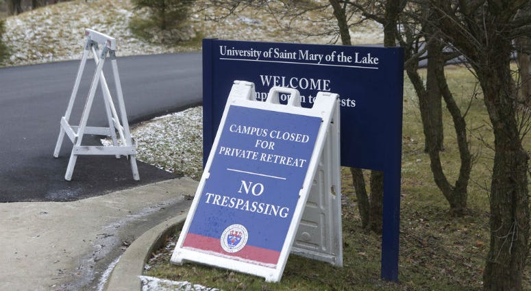 A sign outside the Mundelein Seminary asks the faithful to pray for U.S. based Roman Catholic bishops gathering there for a weeklong prayer retreat, Wednesday, Jan. 2, 2019, in Mundelein, Ill. A sign outside the Mundelein Seminary asks the faithful to pray for U.S. based Roman Catholic bishops gathering there for a weeklong prayer retreat, Wednesday, Jan. 2, 2019, in Mundelein, Ill.