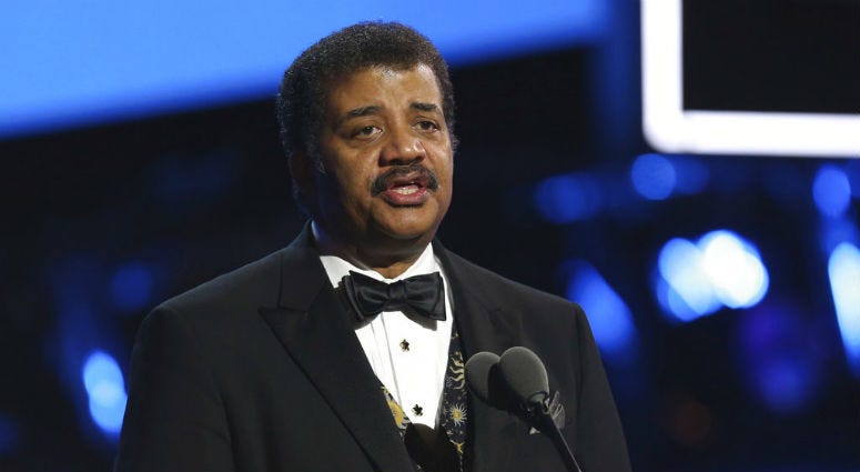FILE - In this Jan. 28, 2018, file photo, Neil deGrasse Tyson speaks at the 60th annual Grammy Awards at Madison Square Garden in New York. FILE - In this Jan. 28, 2018, file photo, Neil deGrasse Tyson speaks at the 60th annual Grammy Awards at Madison Square Garden in New York.