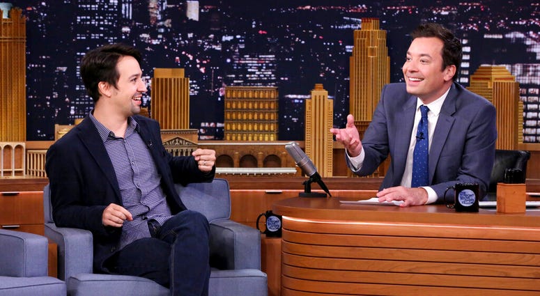 This Oct. 4, 2016 image released by NBC shows Lin-Manuel Miranda during an interview with host Jimmy Fallon on "The Tonight Show Starring Jimmy Fallon," in New York. Lin-Manuel Miranda and Jimmy Fallon on "The Tonight Show Starring Jimmy Fallon."