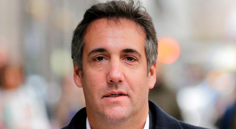 In this April 11, 2018, file photo, Michael Cohen, President Donald Trump's former attorney, walks along a sidewalk in New York. Michael Cohen