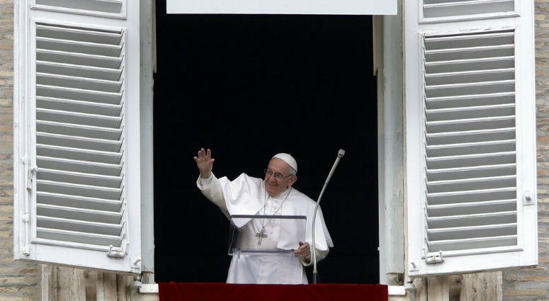 Pope Francis salutes the crowd as he recites the Angelus noon prayer from the window of his studio overlooking St.Peter's Square, at the Vatican, Sunday, Jan. 13, 2019. Pope Francis salutes the crowd as he recites the Angelus noon prayer from the window of his studio overlooking St.Peter's Square, at the Vatican, Sunday, Jan. 13, 2019.