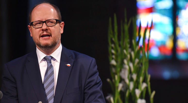 This May 4, 2016 file photo shows Gdansk mayor Pawel Adamowicz speaking at a commemoration ceremony for late Bremen Mayor Hans Koschnick. Gdansk mayor Pawel Adamowicz