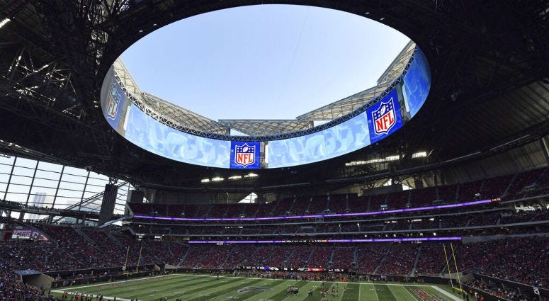 In this Sunday, Dec. 2, 2018, photo, the Atlanta Falcons play the Baltimore Ravens in the Mercedes-Benz stadium during the second half of an NFL football game, in Atlanta. In this Sunday, Dec. 2, 2018, photo, the Atlanta Falcons play the Baltimore Ravens in the Mercedes-Benz stadium during the second half of an NFL football game, in Atlanta.