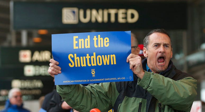 Several dozen federal employees and supporters demonstrated at the Sacramento International Airport calling for President Donald Trump and Washington lawmakers to end then partial government shutdown, Wednesday, Jan. 16, 2019, in Sacramento, Calif. Several dozen federal employees and supporters demonstrated at the Sacramento International Airport calling for President Donald Trump and Washington lawmakers to end then partial government shutdown, Wednesday, Jan. 16, 2019, in Sacramento, Calif.