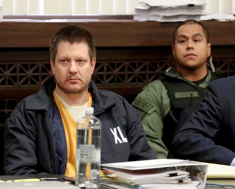 In this Dec. 14, 2018, file photo, former Chicago police Officer Jason Van Dyke, left, appears for a hearing at the Leighton Criminal Court Building, in Chicago. In this Dec. 14, 2018, file photo, former Chicago police Officer Jason Van Dyke, left, appears for a hearing at the Leighton Criminal Court Building, in Chicago.