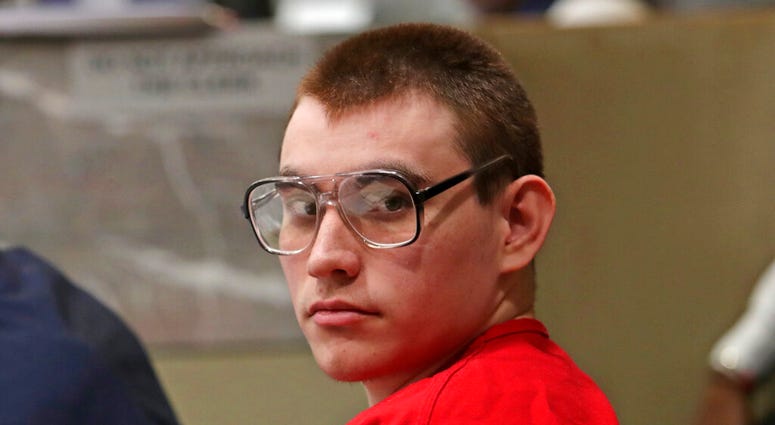 In this Jan. 16, 2019 file photo, Parkland school shooting suspect Nikolas Cruz sits during a status hearing at the Broward Courthouse in Fort Lauderdale, Fla. In this Jan. 16, 2019 file photo, Parkland school shooting suspect Nikolas Cruz sits during a status hearing at the Broward Courthouse in Fort Lauderdale, Fla.