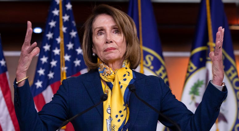 Speaker of the House Nancy Pelosi, D-Calif., talks to reporters a day after officially postponing President Donald Trump's State of the Union address until the government is fully reopened, at the Capitol in Washington, Thursday, Jan. 24, 2019. Speaker of the House Nancy Pelosi