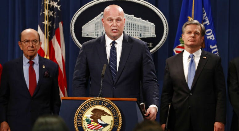 Acting Attorney General Matt Whitaker, center, with Commerce Secretary Wilbur Ross, left, and FBI Director Christopher Wray speak Monday, Jan. 28, 2019, at the Justice Department in Washington. Acting Attorney General Matt Whitaker, center, with Commerce Secretary Wilbur Ross, left, and FBI Director Christopher Wray speak Monday, Jan. 28, 2019, at the Justice Department in Washington.