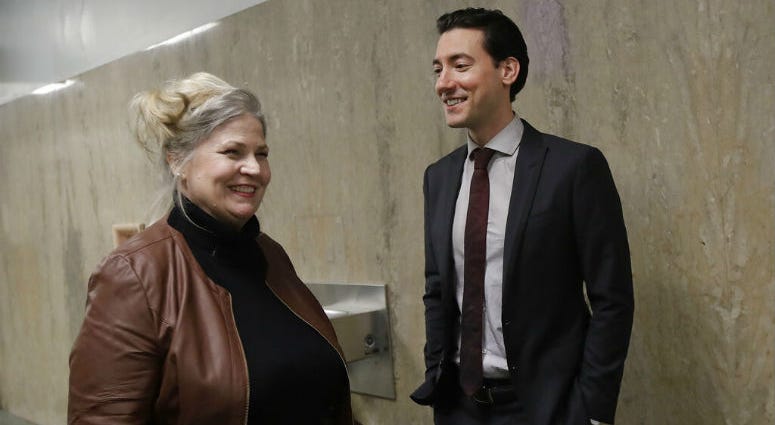 Sandra Merritt, left, smiles as she talks with David Daleiden outside of a courtroom in San Francisco, Monday, Feb. 11, 2019. Sandra Merritt, left, smiles as she talks with David Daleiden outside of a courtroom in San Francisco, Monday, Feb. 11, 2019.