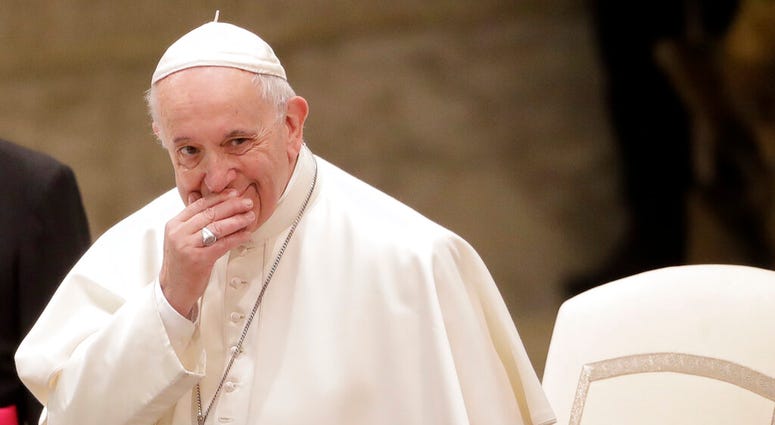 Pope Francis arrives at the Pope Paul VI hall for his weekly general audience, at the Vatican, Wednesday, Feb. 13, 2019. Pope Francis