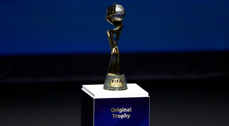 In this Dec. 8, 2018, file photo, the Women's World Cup trophy is displayed at the women's soccer 2019 World Cup draw, in Boulogne-Billancourt, outside Paris. Women's World Cup trophy