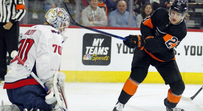 Philadelphia Flyers' Brian Elliott, right, skates past Oskar Lindblom, left, as he leaves the game after giving up his fourth goal during the second period of an NHL hockey game against the Washington Capitals, Wednesday, March 6, 2019, in Philadelphia. Philadelphia Flyers' Brian Elliott, right, skates past Oskar Lindblom, left, as he leaves the game after giving up his fourth goal during the second period of an NHL hockey game against the Washington Capitals, Wednesday, March 6, 2019, in Philadelphia.