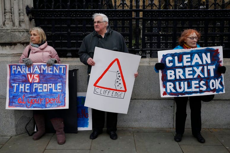 Pro-Brexit leave the European Union supporters, take part in a protest outside the Houses of Parliament in London, Tuesday, March 12, 2019. Pro-Brexit leave the European Union supporters, take part in a protest outside the Houses of Parliament in London, Tuesday, March 12, 2019.